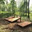 Treplattform i skogen for produktet Situps.
