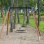 Bird Nest Swing (BNS 120 cm) på lekeplass i skog.