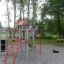 Lekeplass med Klatretorg og barn som leker.