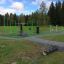 Utendørs treningsanlegg Tressfit i grønt landskap.